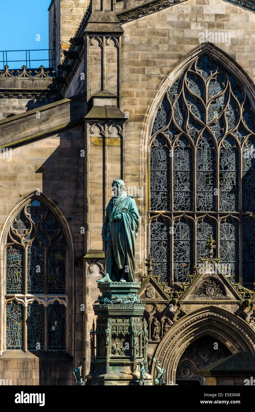 Statue of Walter Scott, 5th Duke of Buccleuch located in Parliament Square, Edinburgh in front of St Giles' Cathedral. St Giles' Stock Photo