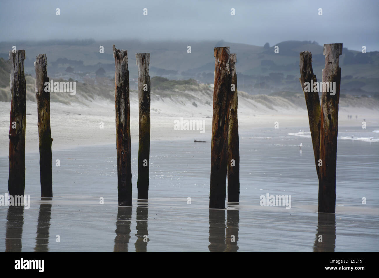 Old pier of St Clair Beach on a stormy day, Dunedin, New Zealand Stock Photo