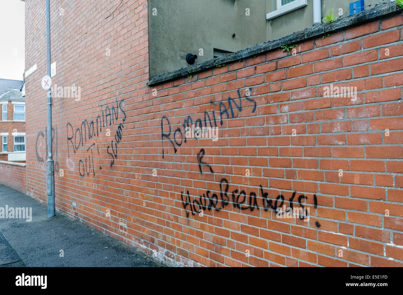 Belfast, Northern Ireland. 29th July, 2014. Graffiti saying 'C18! Romanians Out! Scum.  Romanians R [sic] Housebreakers' spraypainted  on a wall in Belfast. Credit:  Stephen Barnes/Alamy Live News Stock Photo