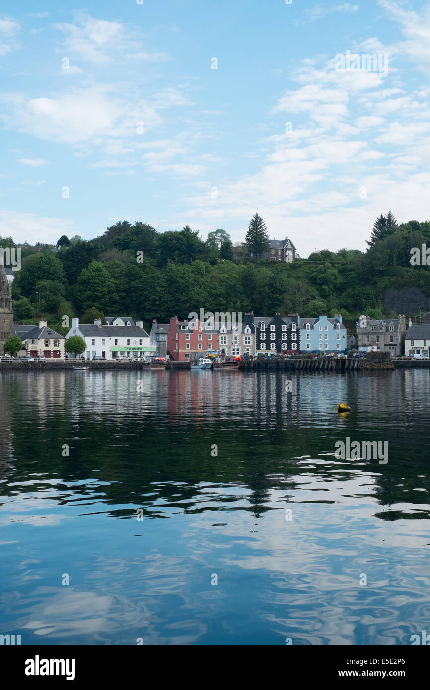 Salt water reflections of homes, Tobermory harbour, Isle of Mull, Scottish Islands Stock Photo