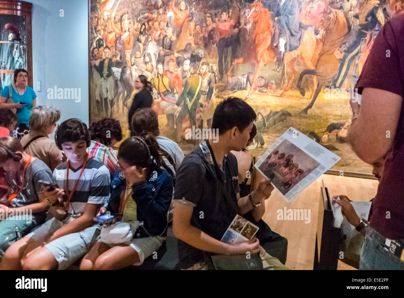Amsterdam, Holland, inside, The Netherlands, the Rijksmuseum, Brochure, Chinese teenagers Tourists Man looking at Paintings collection, admiring art Stock Photo