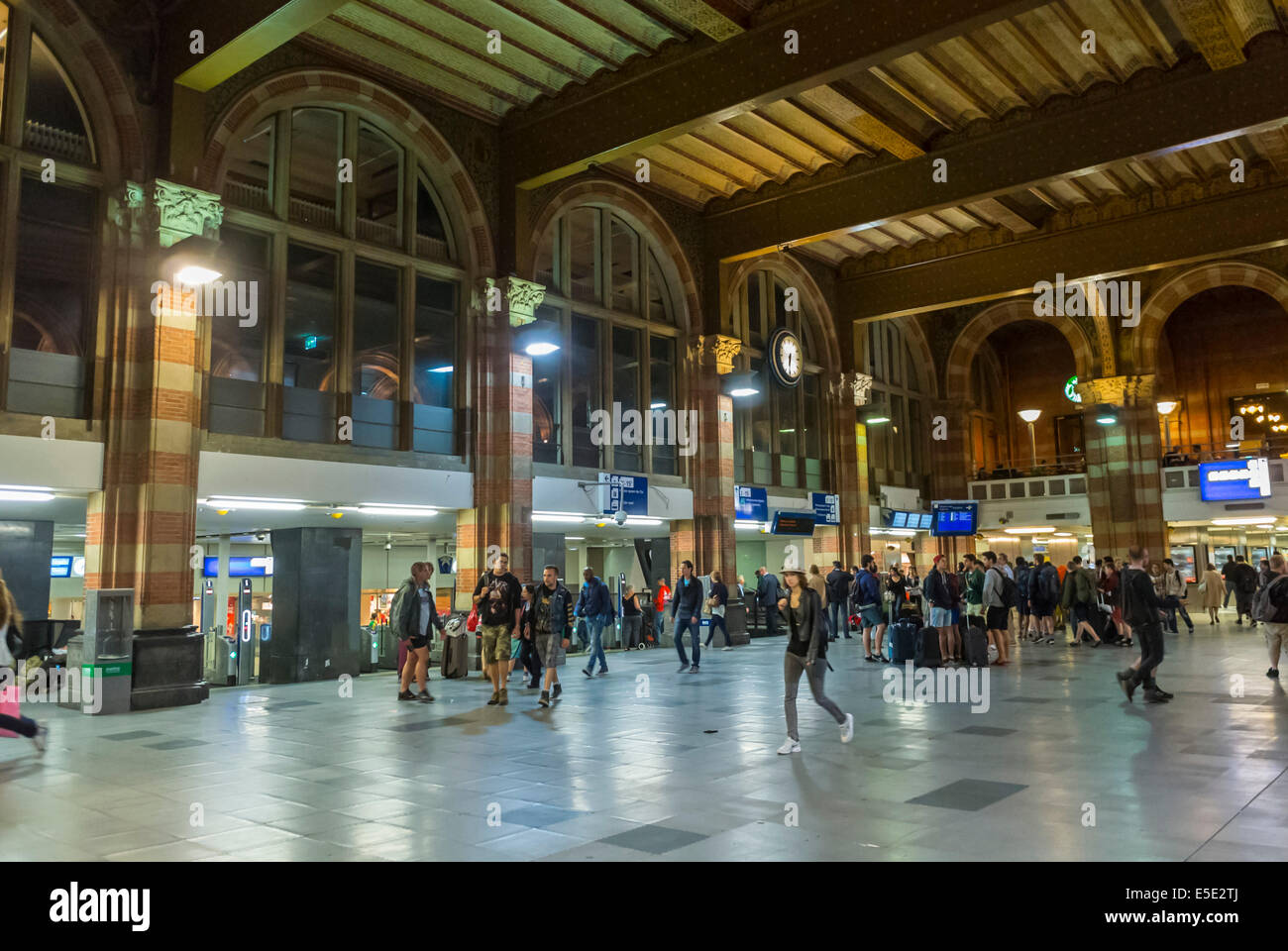 Amsterdam, Holland, The Netherlands, Central  train Station, Tourists inside Main Crowded Hallway Stock Photo