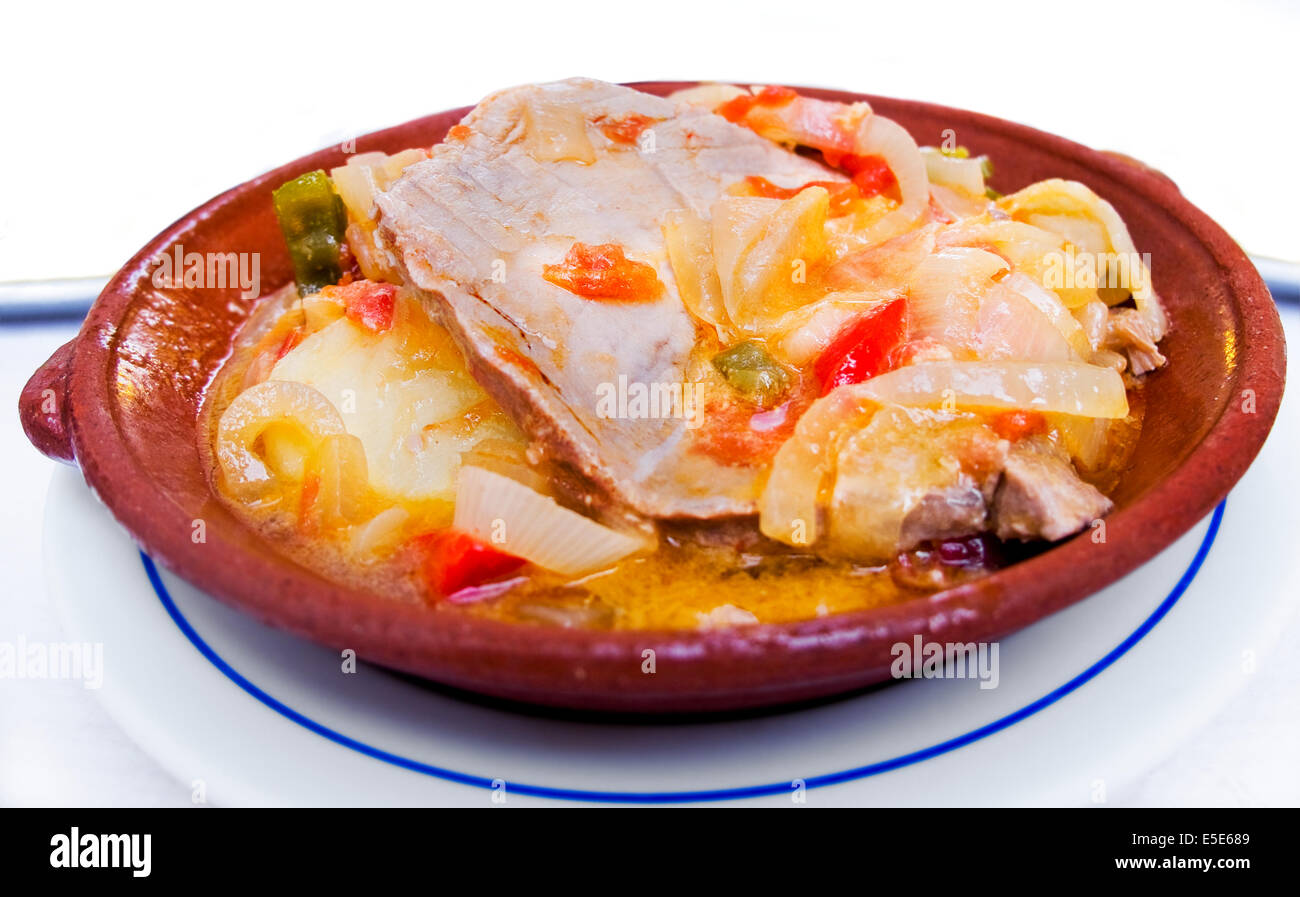 Tuna with onions stew Tavira style. Typical Algarve dish. Bifes de atum cebolada ‡ Tavira. Algarve, Portugal Stock Photo