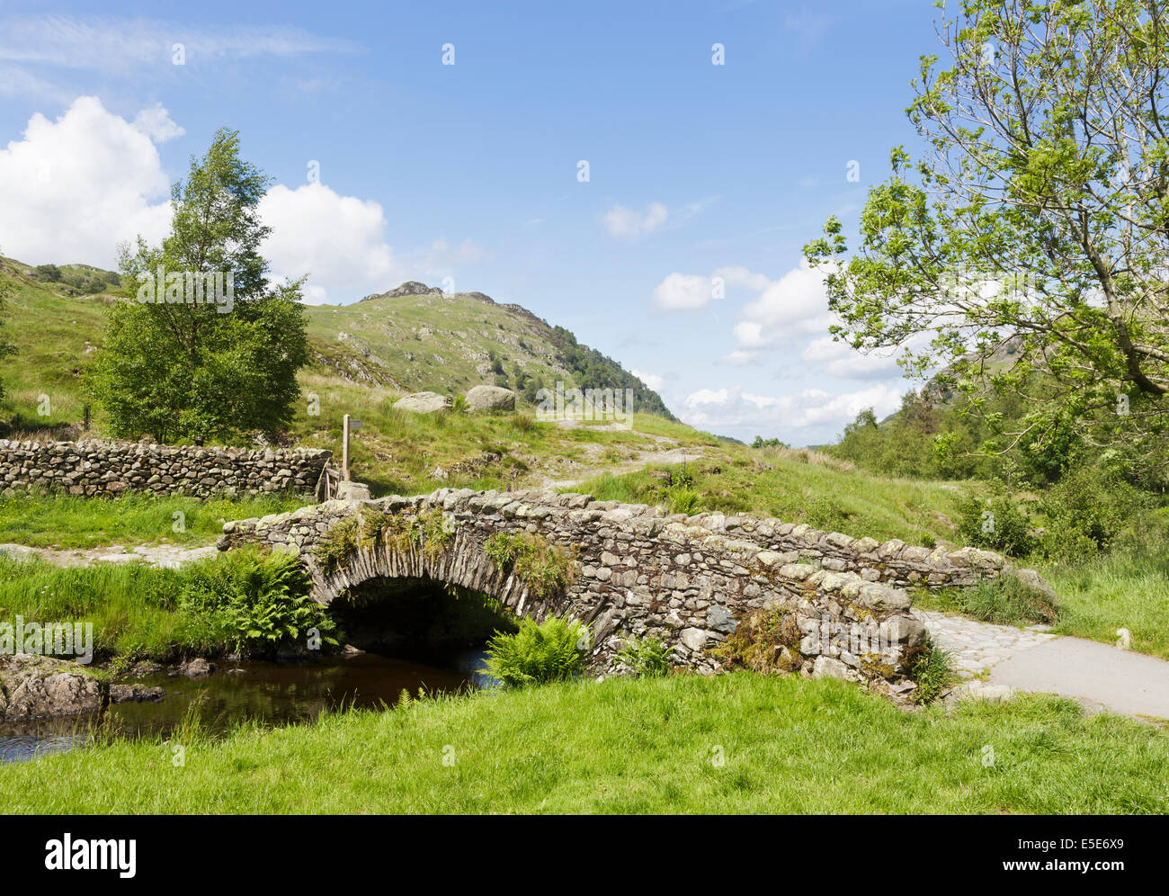 Packhorse Bridge, build of traditional drystone, at Watendlath, Borrowdale, Lake District, Cumbria Stock Photo