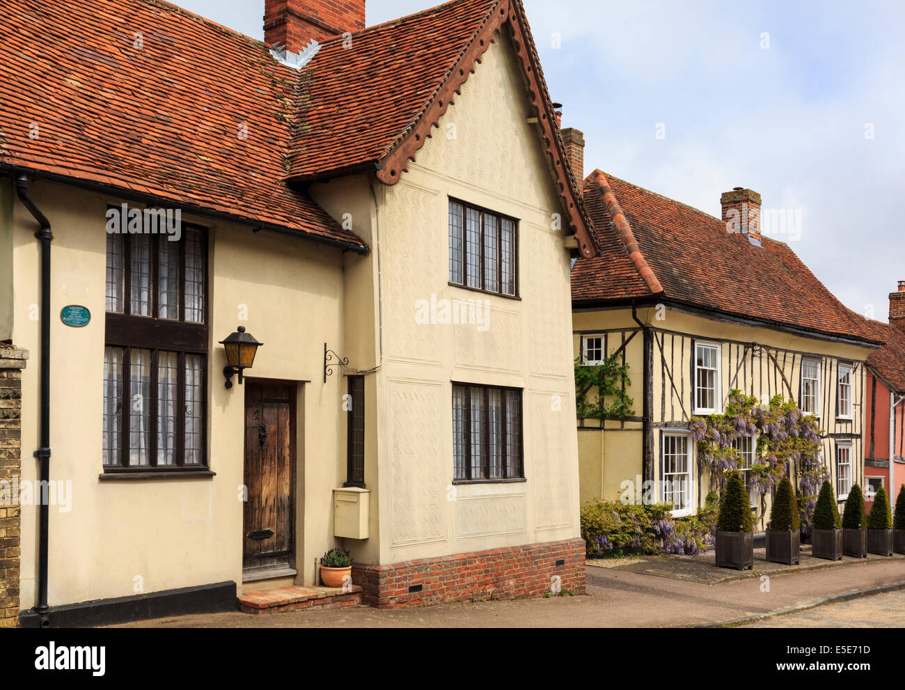 Street scene with quaint old detached houses in village of Lavenham