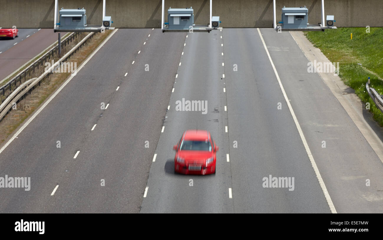 Gatso speed cameras on all lanes of the M1 motorway on the gantry in a variable speed limit area Stock Photo