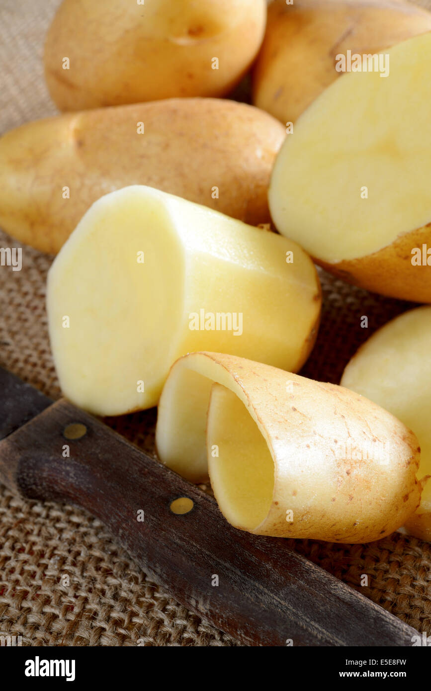 yellow sweet potato on ancient wooden table Stock Photo