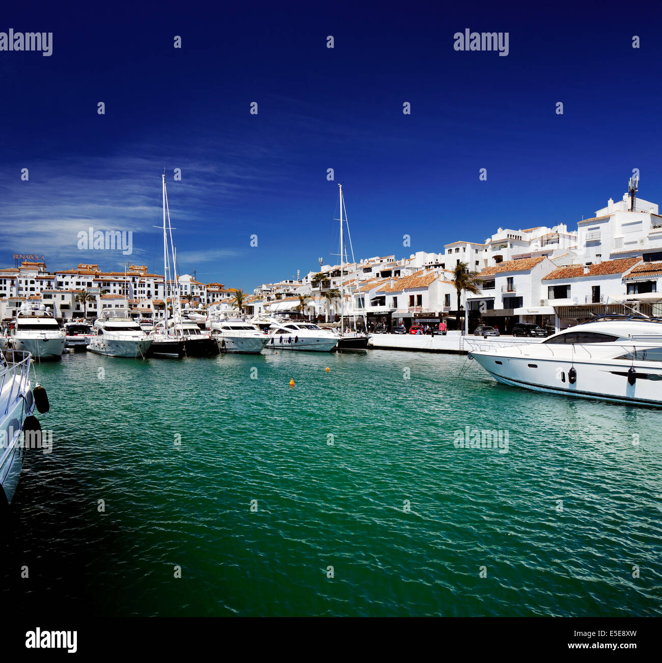 Luxury yachts and motor boats moored in Puerto Banus marina in Marbella, Spain. Marbella is a popular holiday destination Stock Photo