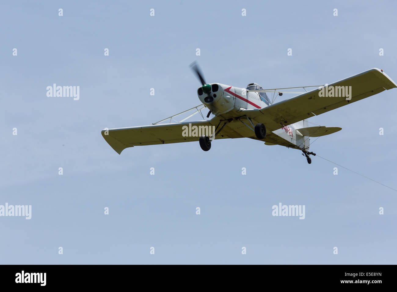 Piper Pawnee tow plane flying at Harris Hill Soaring Center in Horseheads near Elmira New York Stock Photo