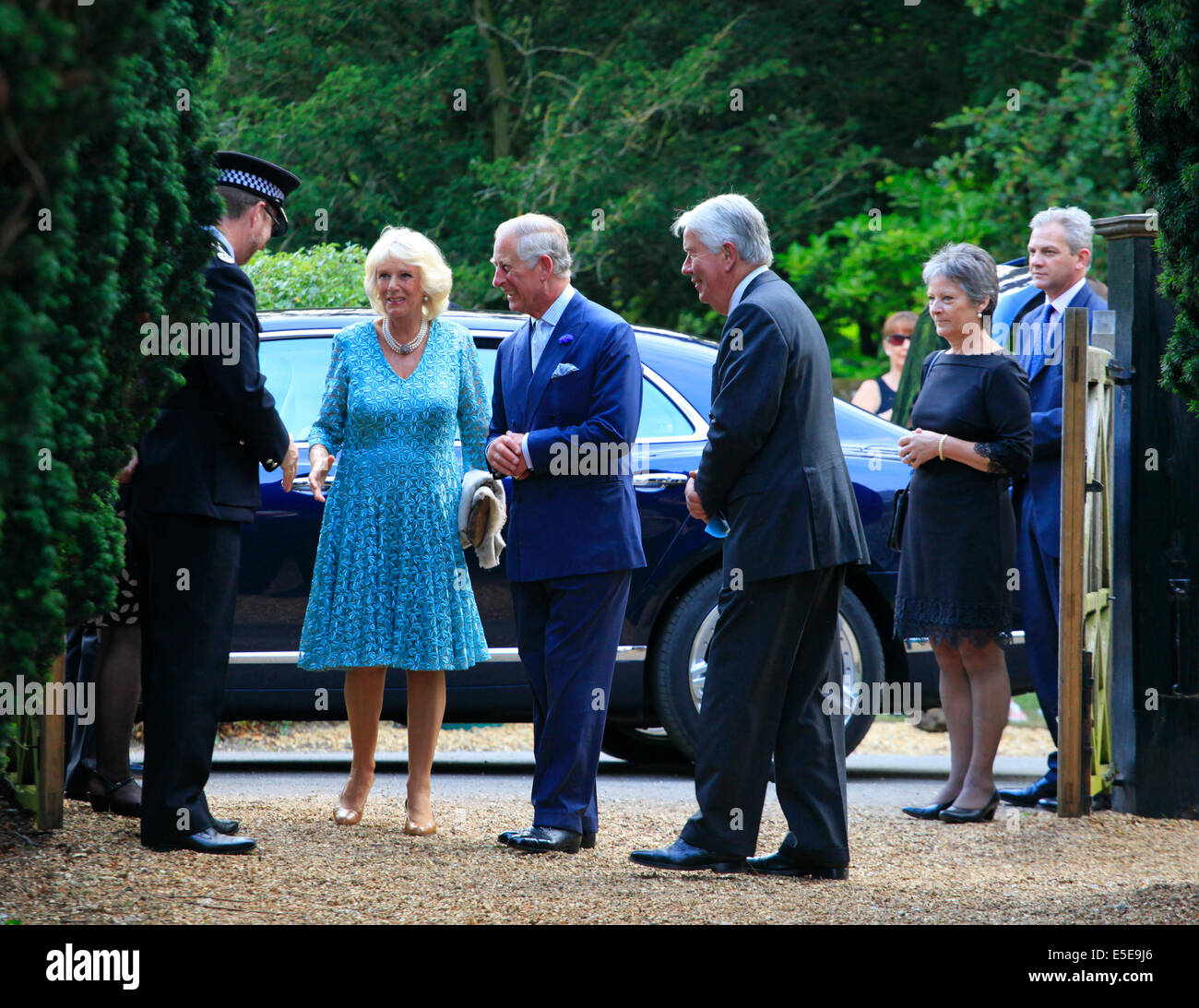 St Mary's church, Old Hunstanton, Norfolk, England, UK. 29 July 2014. HRH The Prince of Wales and HRH The Duchess of Cornwall arrive at St Mary's church, Old Hunstanton, to attend a Music in Country Churches concert in Norfolk. Founded in 1989, Music in Country Churches was set up with the support of the Prince of Wales, with the aim of bringing world-class musicians to country churches of particular beauty and importance. Credit:  Stuart Aylmer/Alamy Live News Stock Photo