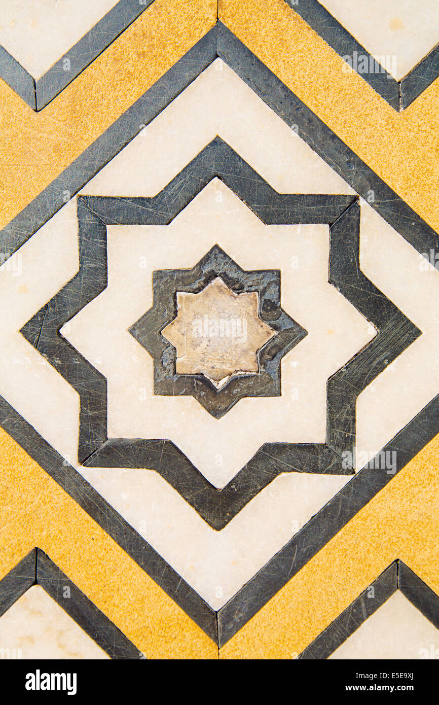 A detail of a vandalised design (missing central jewel) on Taj Mahal, made with semi-precious stones, Taj Mahal, Agra, India Stock Photo