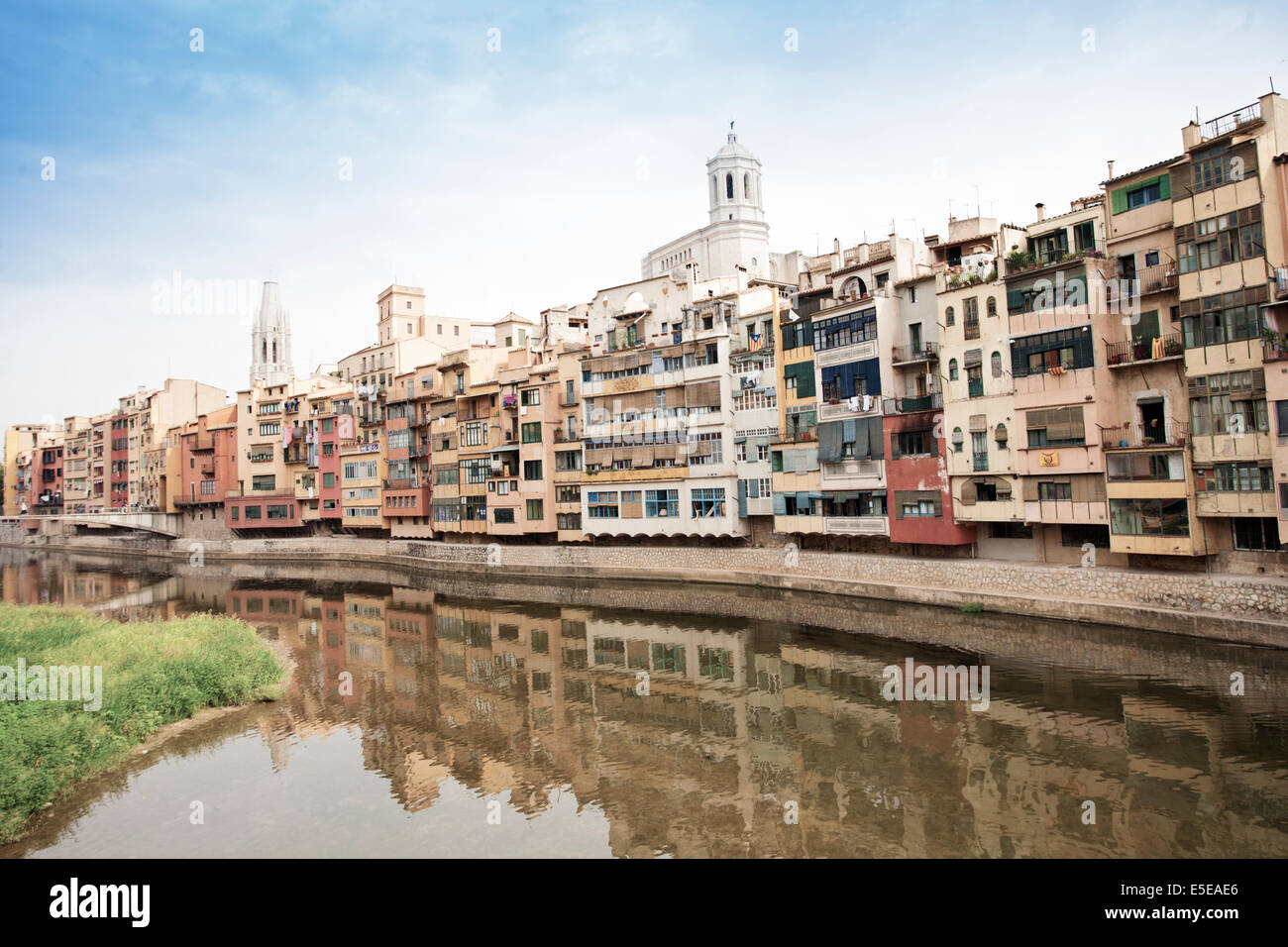 Girona cathedral and Colorful buildings along the banks of River Onyar in Girona, Catalonia, Spain Stock Photo