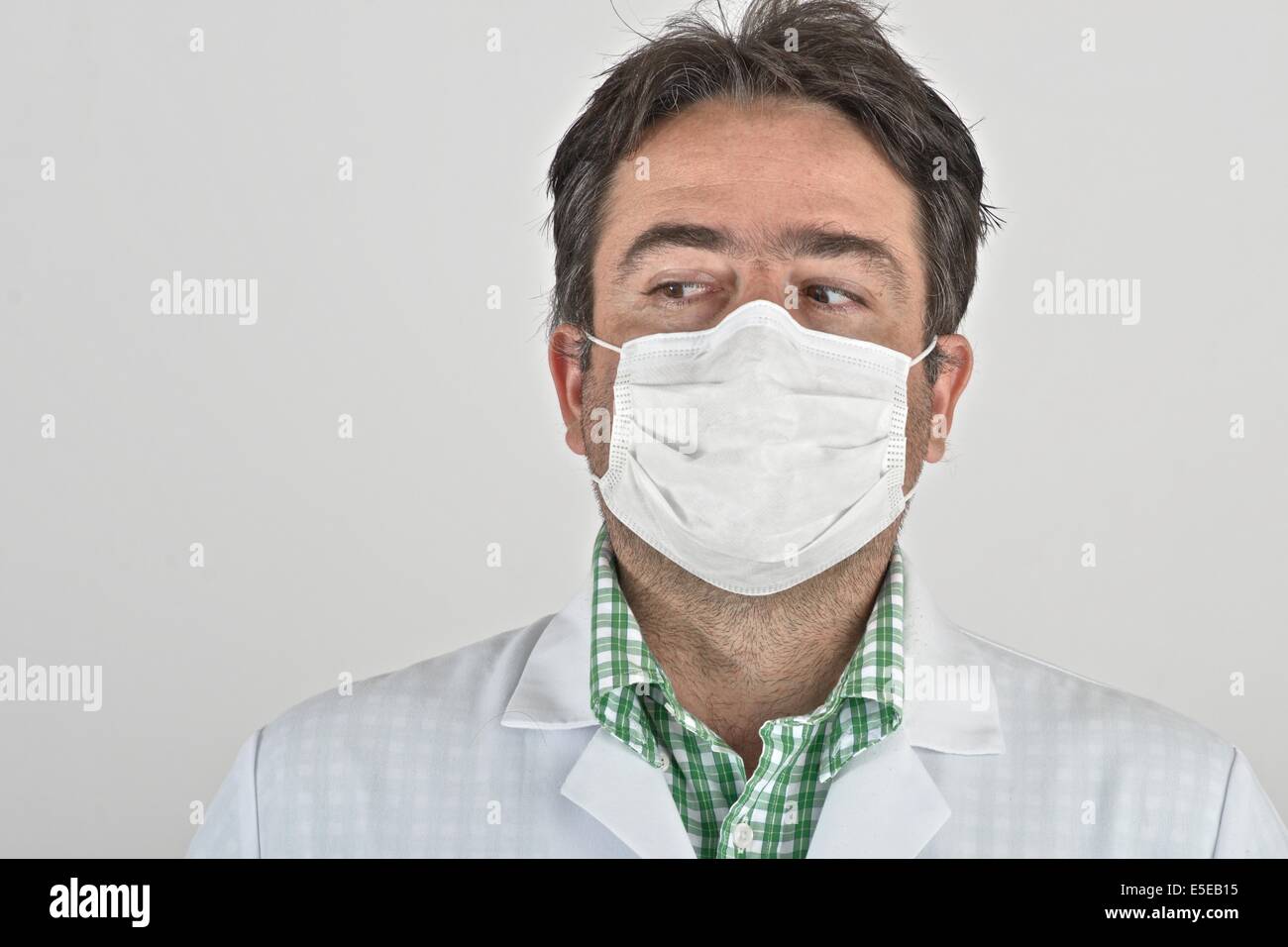 Hispanic doctor with face mask. Stock Photo