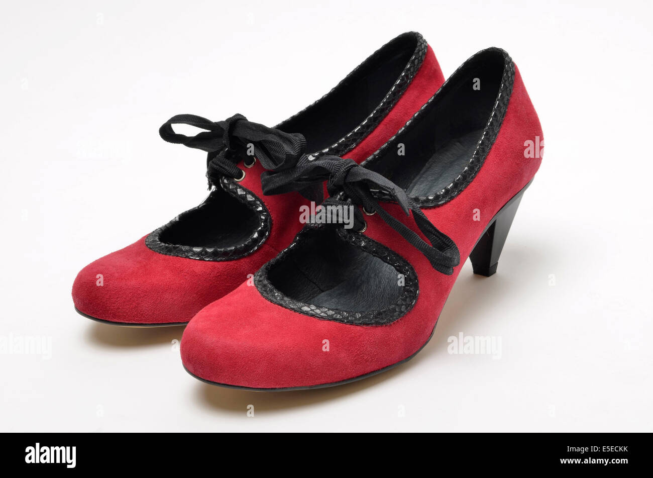 Red retro style suede shoes by Topshop Stock Photo