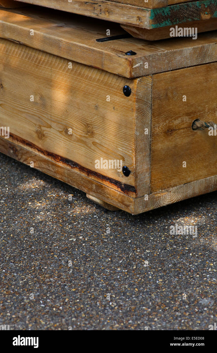 Old wooden boxes with rope handles on street, recycled wood Stock Photo -  Alamy
