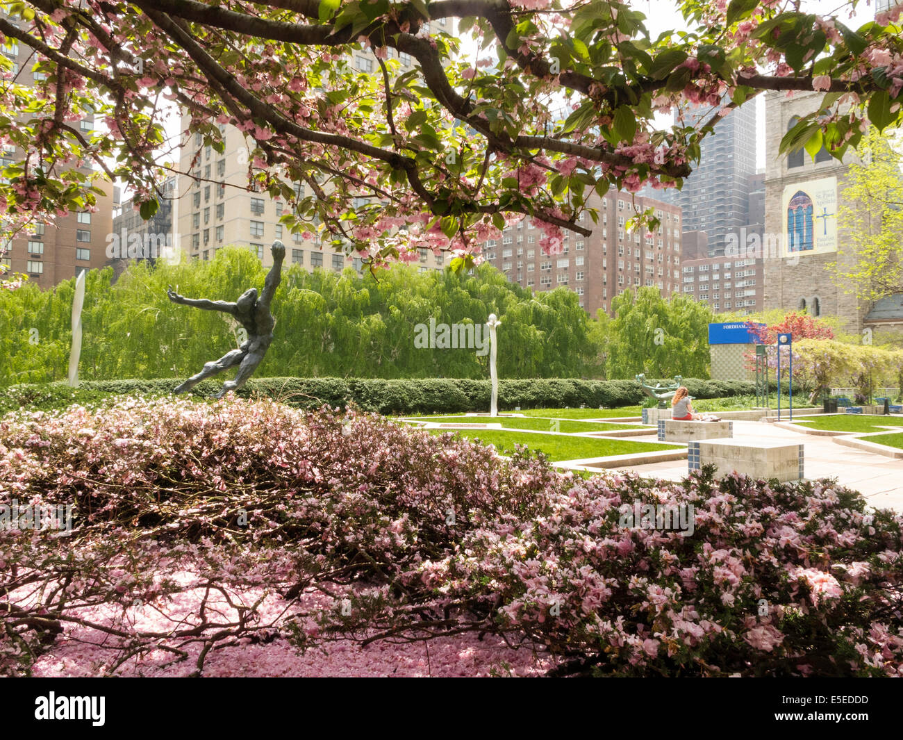 Fordham University, Soaring Figure Statue, Lincoln Center Campus Grounds in Springtime, NYC, USA Stock Photo