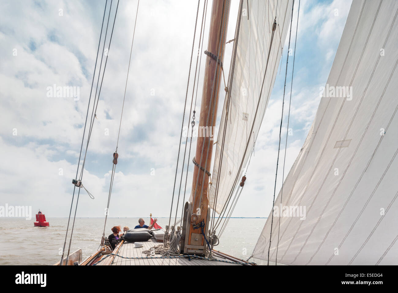 Sailing on the Waddenzee Wadden Sea on a traditional Lemsteraak sailing ship sailboat. Netherlands Unesco World Heritage Site Stock Photo