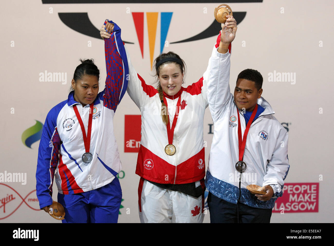 Clyde Auditorium, Glasgow, Scotland, UK, Tuesday, 29th July, 2014. Medal Winners in the Women’s 75kg Group A Weightlifting Competition at the Glasgow 2014 Commonwealth Games. Left to Right. Mary Opeloge, Samoa, Silver, Marie-Eve Beauchemin-Nadeau, Canada, Gold, Apolonia Vaivai, Fiji, Bronze Stock Photo