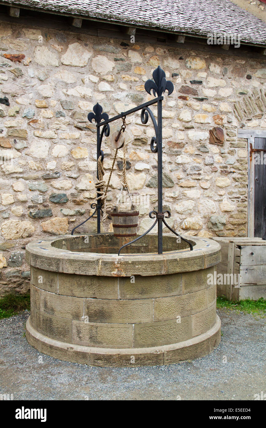 Water well in the 1700's French Fortress of Louisbourg, now a National Historical Site.Louisbourg,Nova Scotia,Canada Stock Photo