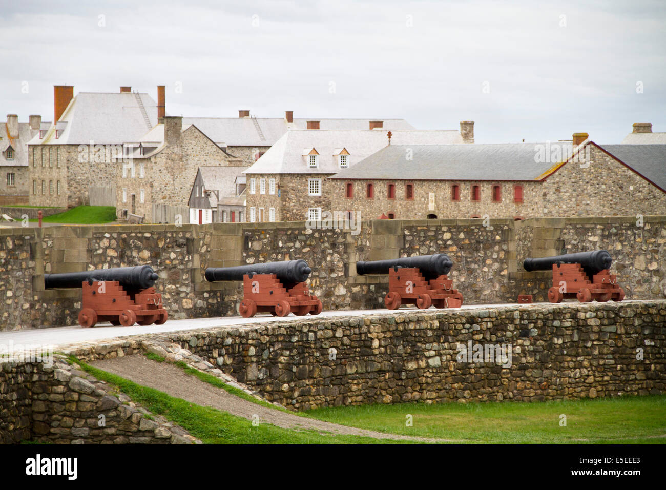 Cannons line the ramparts of the Fortress of Louisbourg, one of the main outposts of France in Eastern Canada in the 1700's, now Stock Photo
