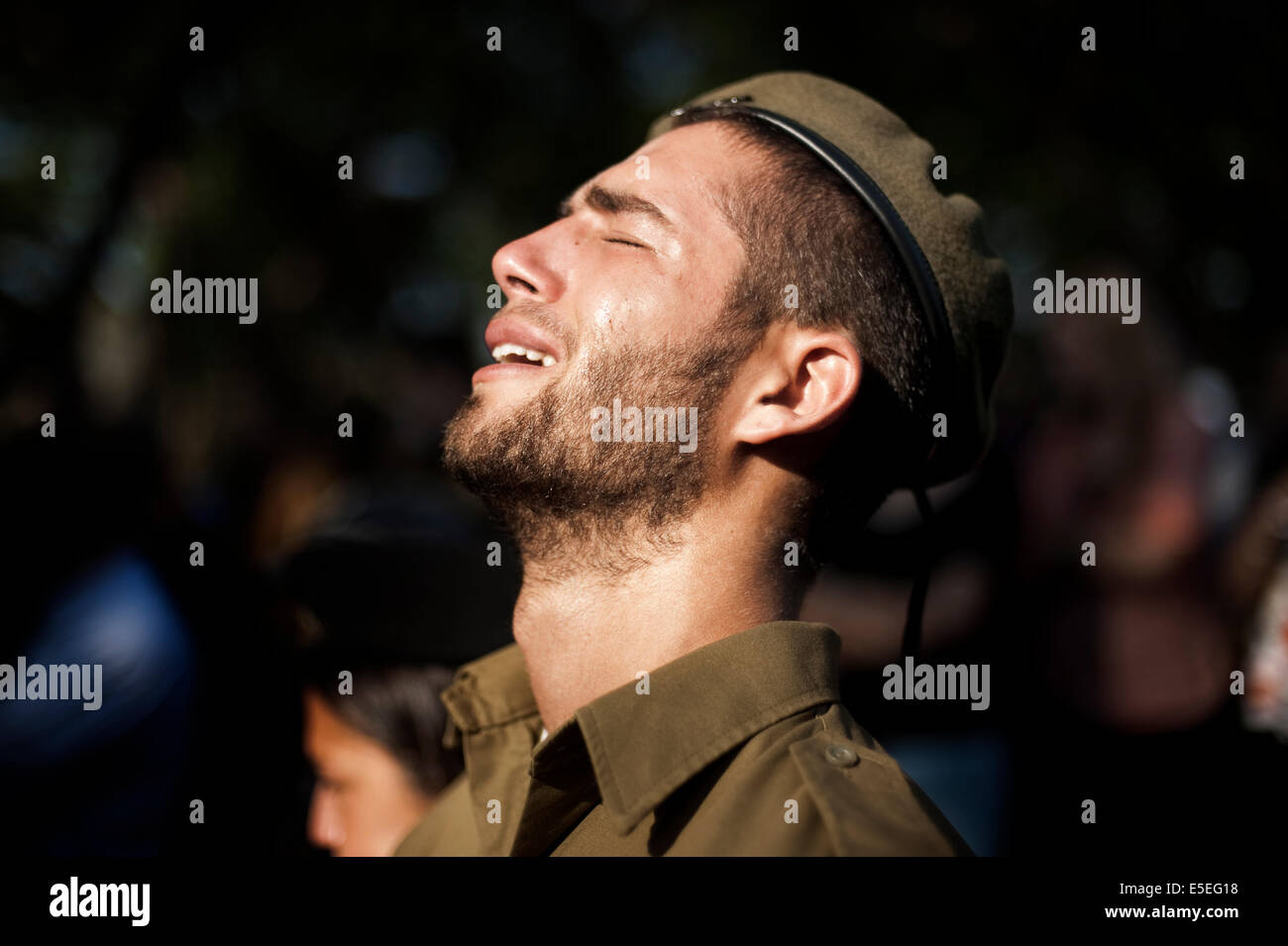 An Israeli soldier cries during the funeral of Sergeant Daniel Kedmi at Kiryat Shaul cemetery. The IDF soldier was killed by a mortar shell during attempted terrorist infiltration close to the Gaza border. © Marco Bottelli/Pacific Press/Alamy Live News Stock Photo