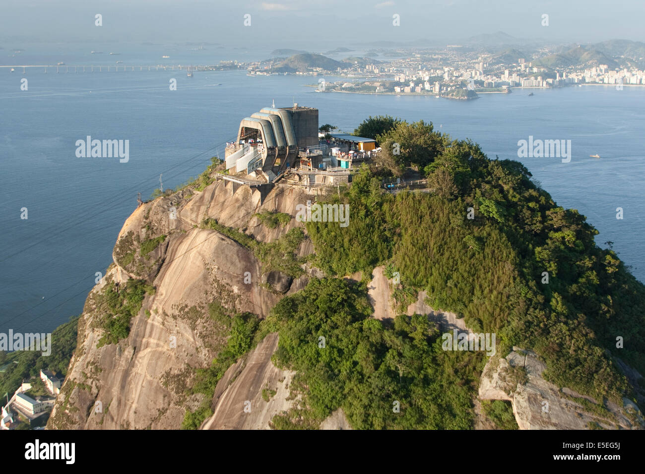 Aerial view of the cable car station on Sugar Loaf mountain with Guanabara Bay and Niteroi in the distanc Rio de Janeiro, Brazil Stock Photo