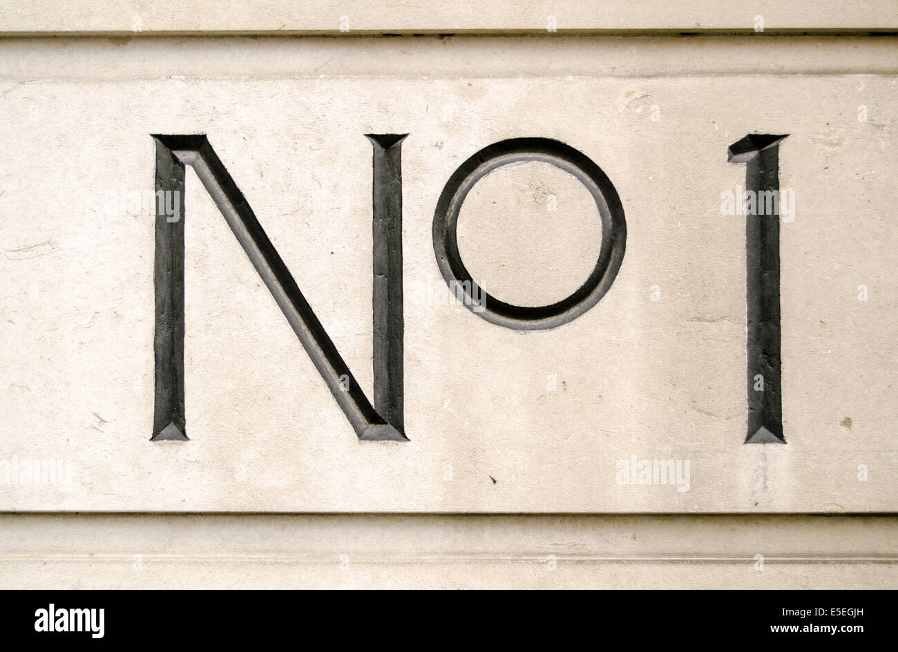 Sign for number one on the outside of an office block in central London. Stock Photo