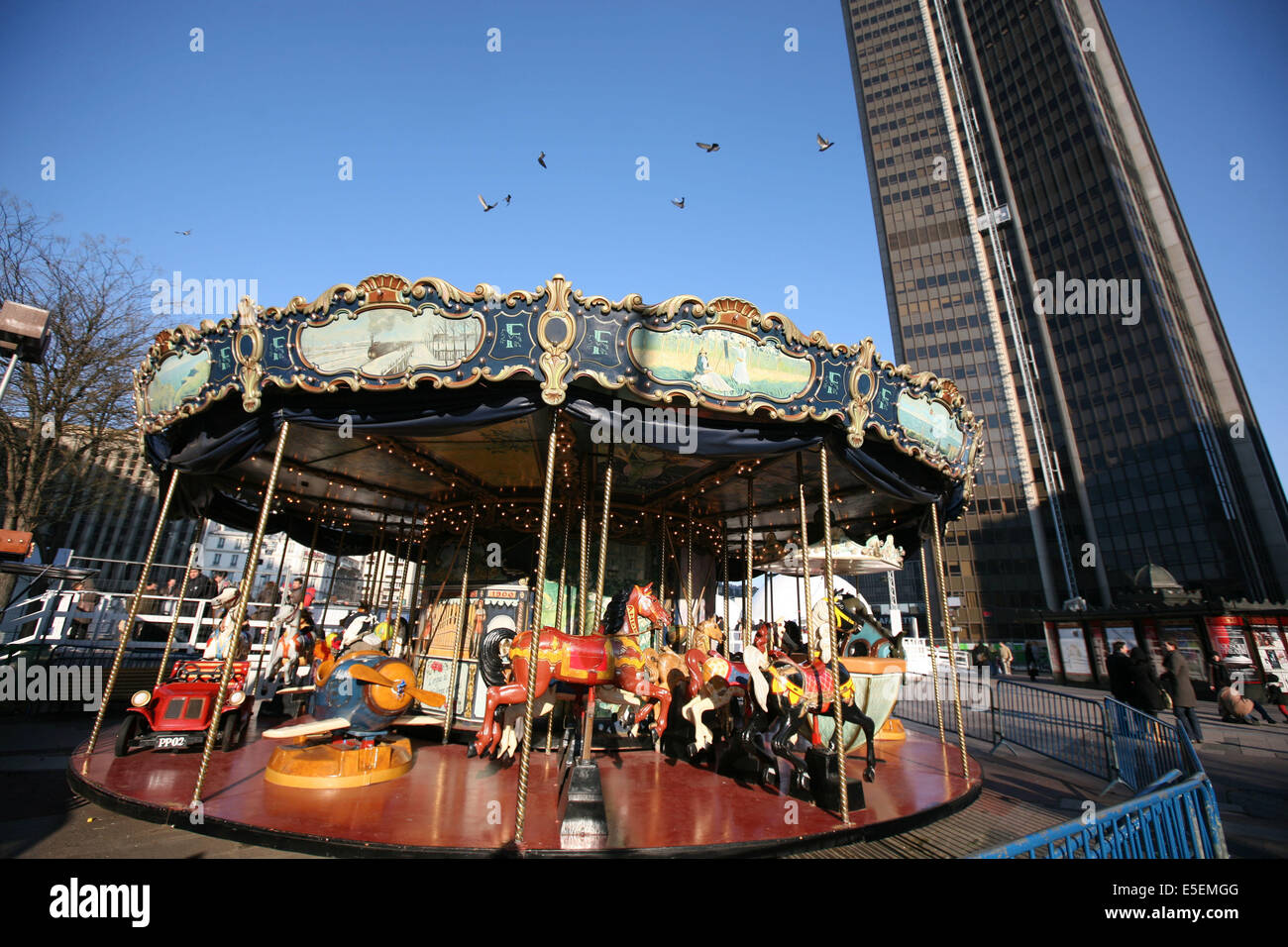 France, paris 14e, manege au pied de la tour montparnasse, carrousel Stock  Photo - Alamy
