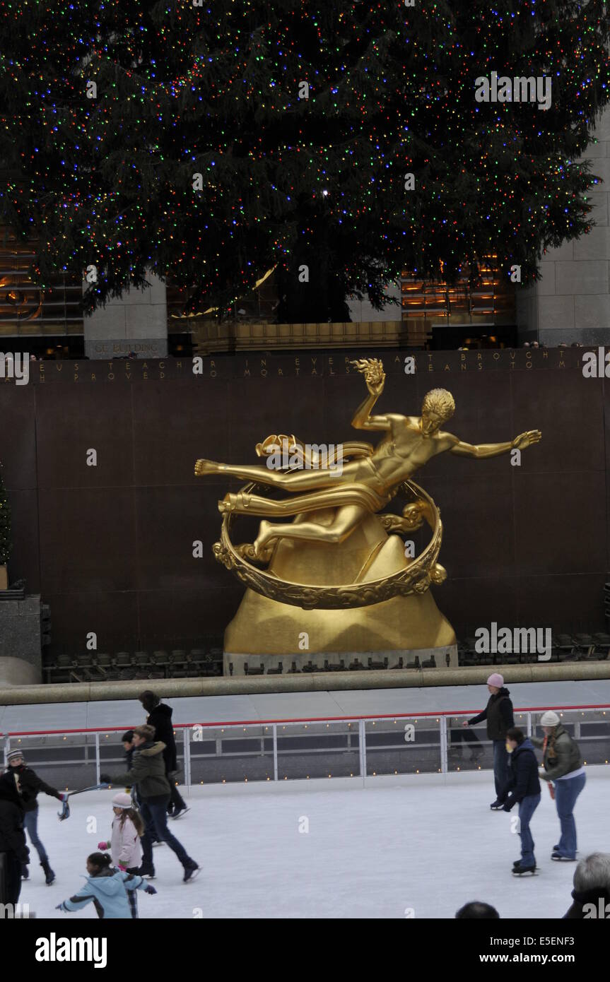Golden statue rockefeller center ice hires stock photography and