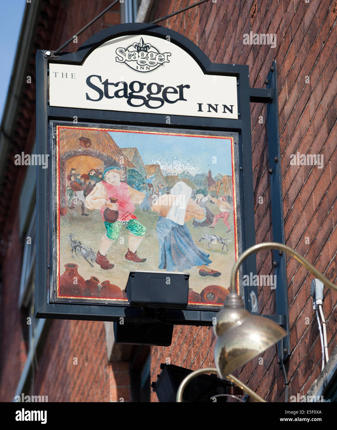 Hanging pub sign for The Stagger Inn, London Road, Grantham, Lincolnshire, England, UK. Stock Photo