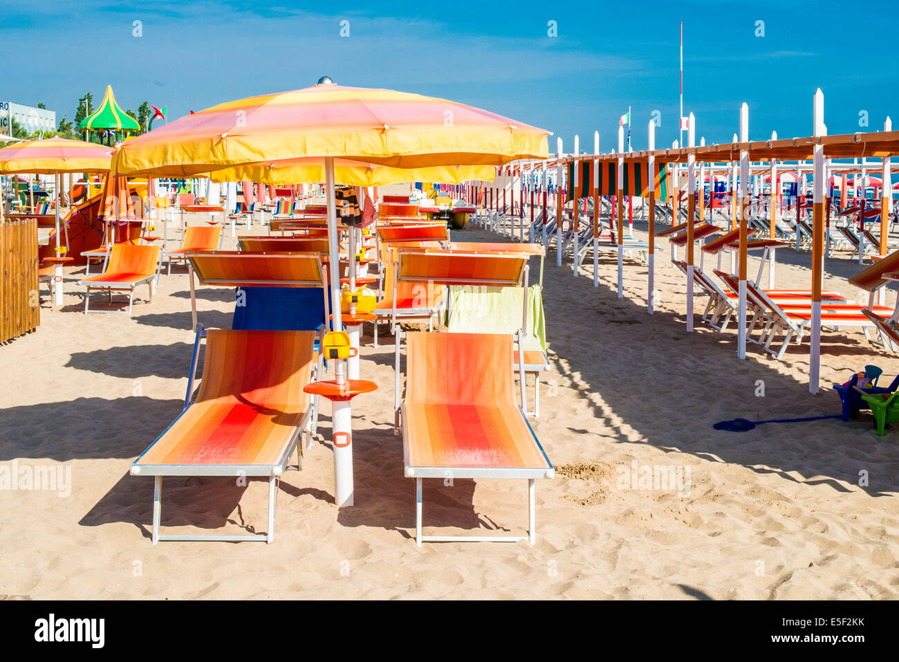 Orange sunbeds and umbrellas on the beach Stock Photo Alamy