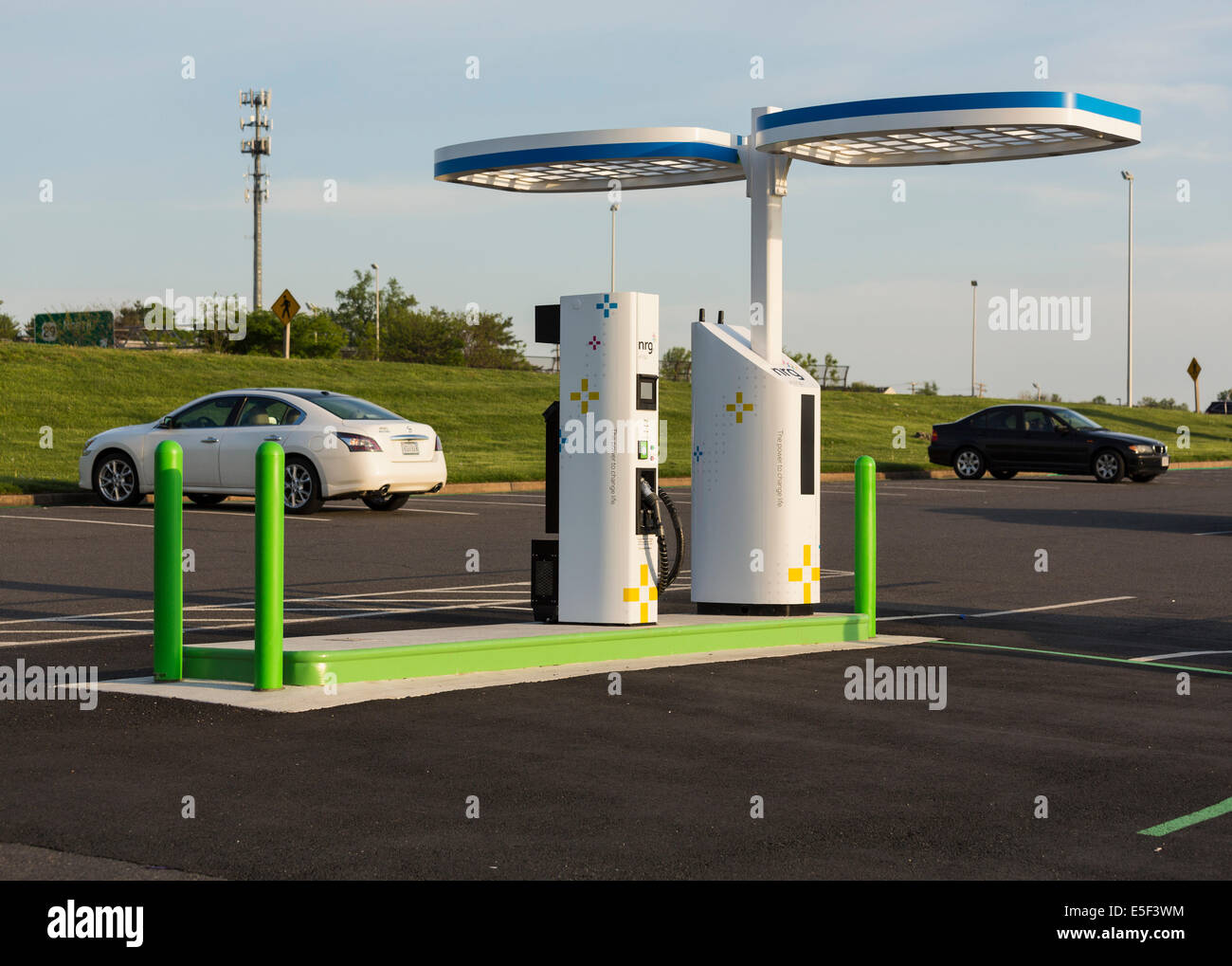 Electric car charging station and parking lot in USA installed by NRG eVGO to recharge electric cars Stock Photo