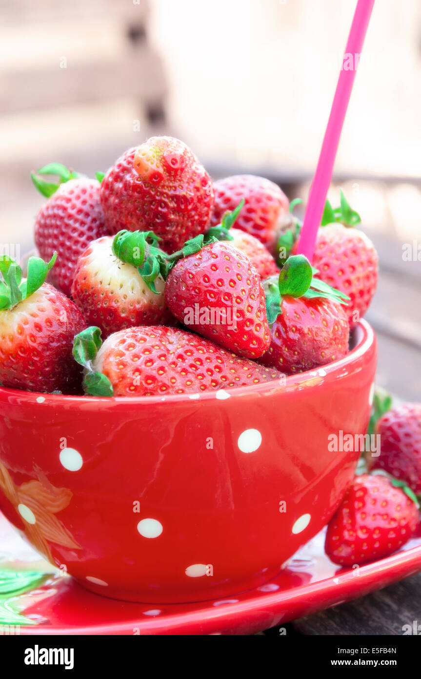 Cup with strawberries Stock Photo