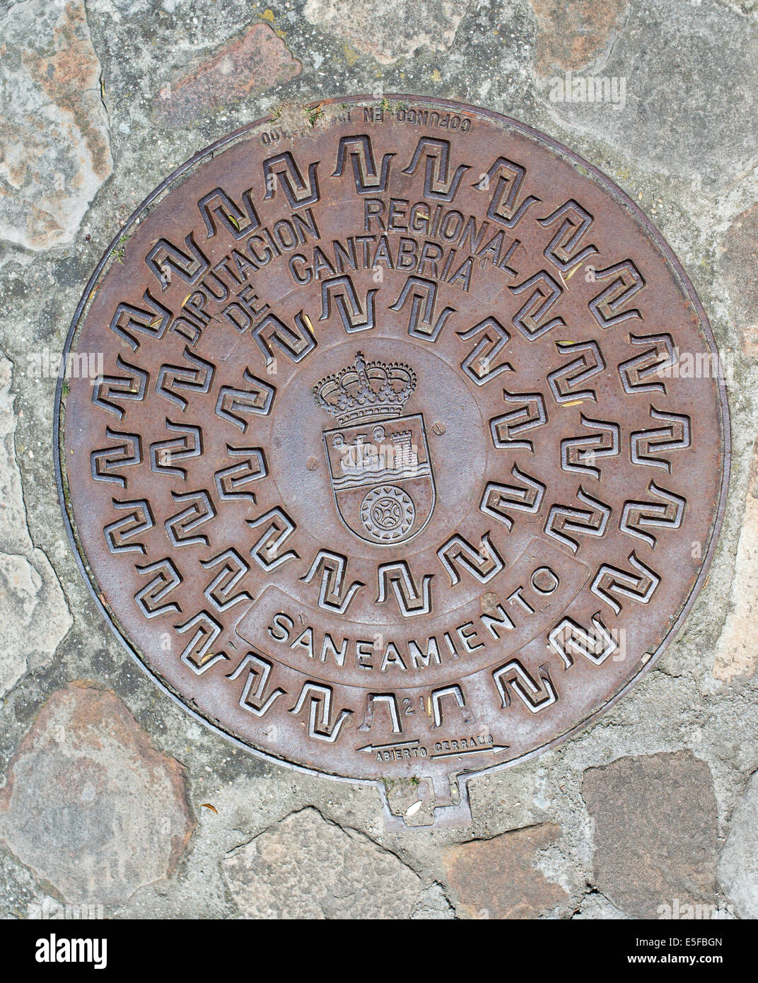 Cast iron manhole cover with Cantabrian coat of arms, Cantabria, Northern  Spain, Europe Stock Photo