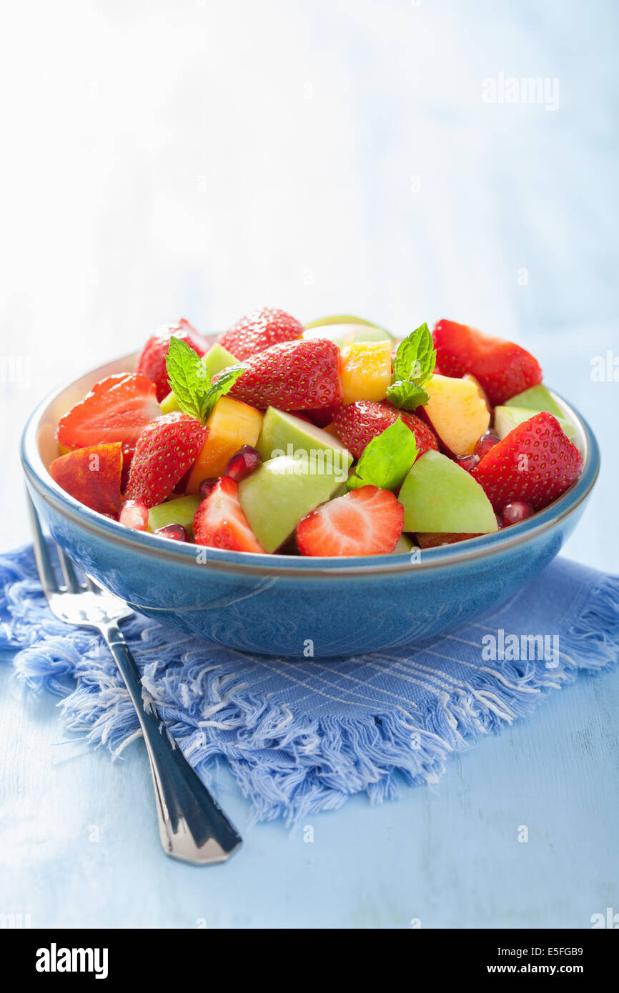 fresh fruit salad with strawberry, apple, nectarine, pomegranate Stock