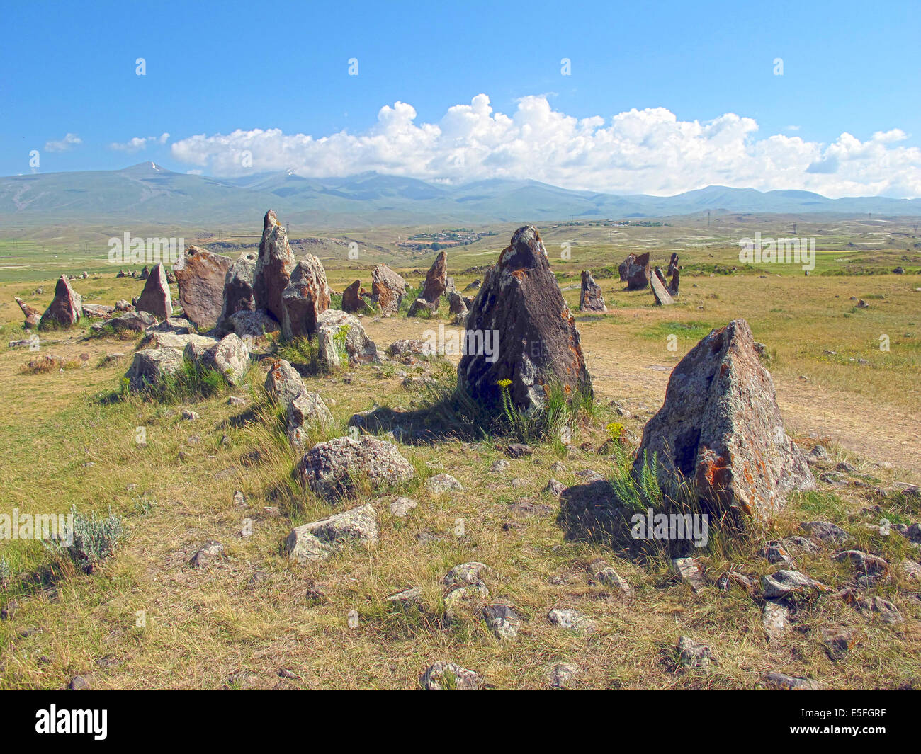 Sisian, Armenia. 27th June, 2014. Megaliths are seen at the prehistoric archaeological site Zorats Karer near Sisian, Armenia, 27 June 2014. The site served as a necropolis from the Middle Bronze Age to the Iron Age. Photo: Jens Kalaene -NO WIRE SERVICE-/dpa/Alamy Live News Stock Photo