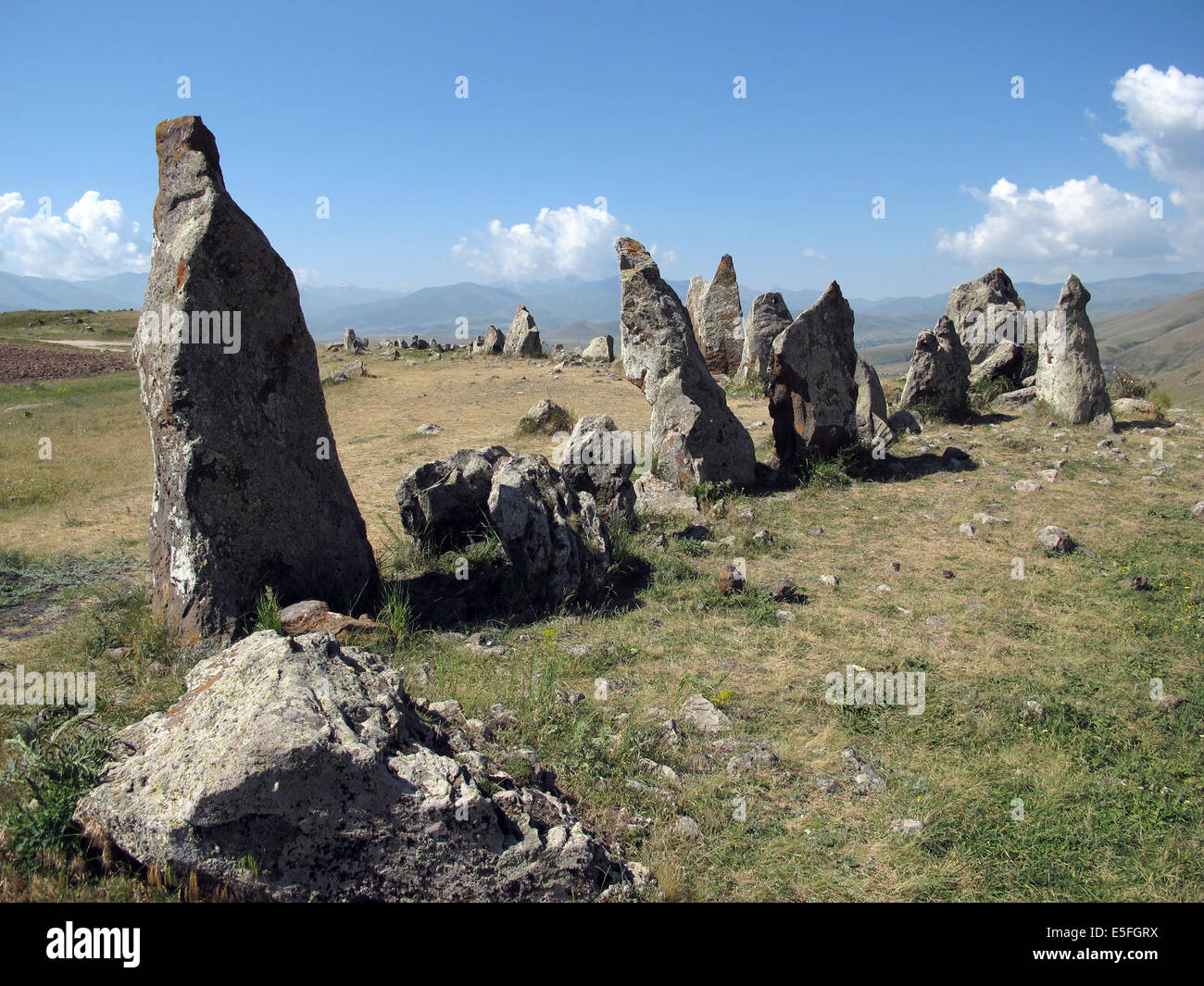 Sisian, Armenia. 27th June, 2014. Megaliths are seen at the prehistoric archaeological site Zorats Karer near Sisian, Armenia, 27 June 2014. The site served as a necropolis from the Middle Bronze Age to the Iron Age. Photo: Jens Kalaene -NO WIRE SERVICE-/dpa/Alamy Live News Stock Photo