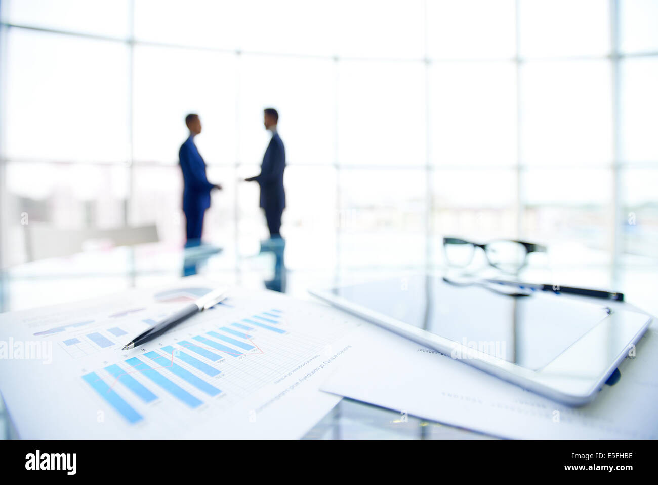 Close-up of business objects at workplace on background of office ...