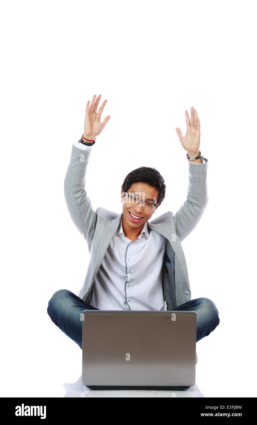 Excited Asian young man, full length portrait Stock Photo - Alamy