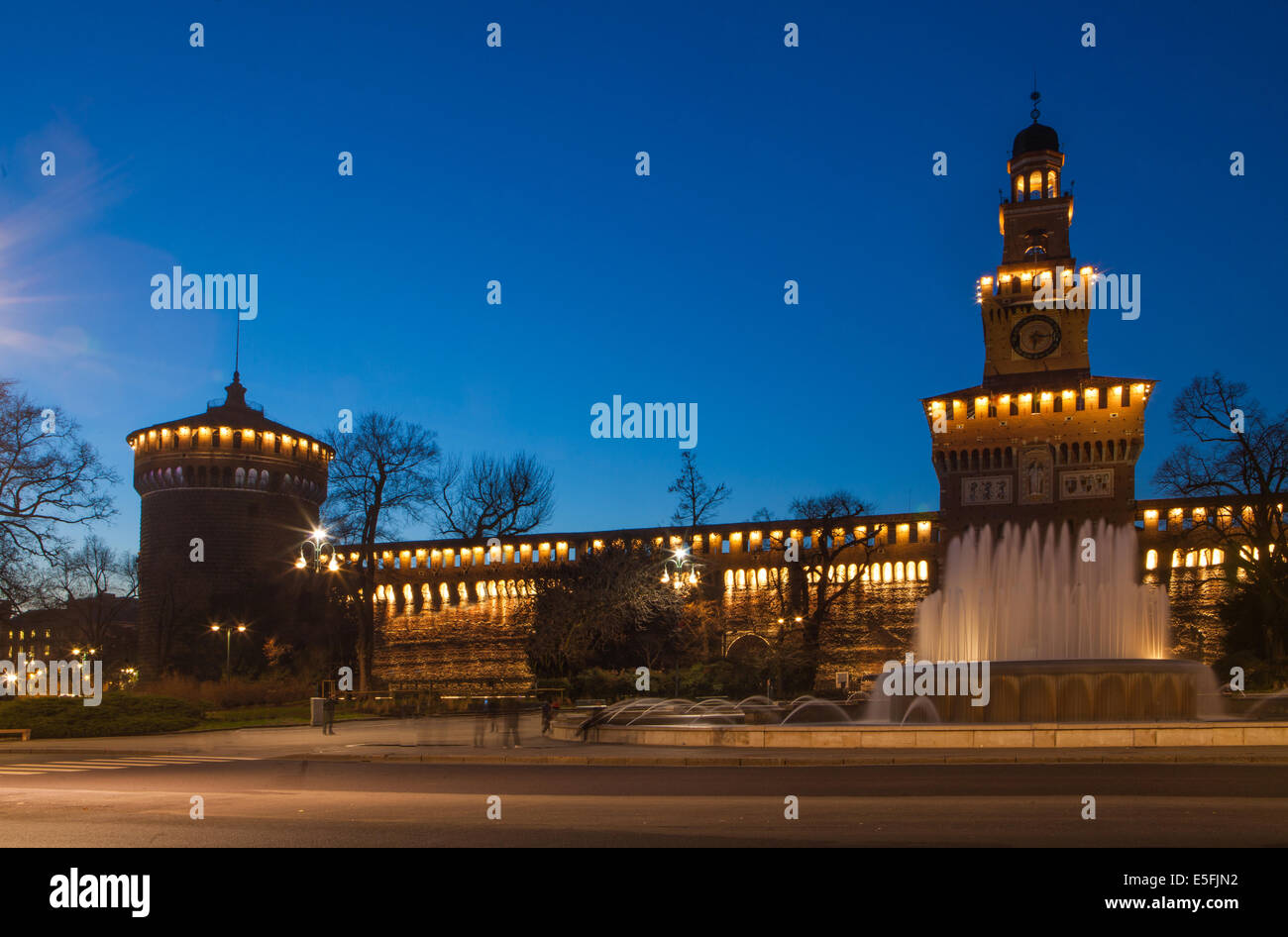 Sforzesco Castle by night in Milan, Italy Stock Photo