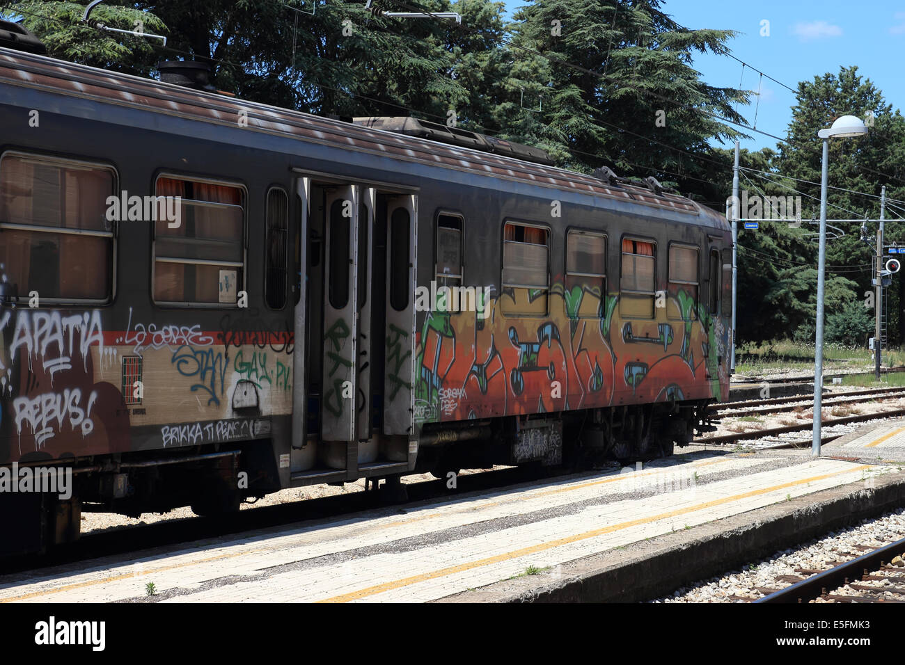 AREZZO ITALY JULY 16 2014 Graffiti Vandalism over trains in