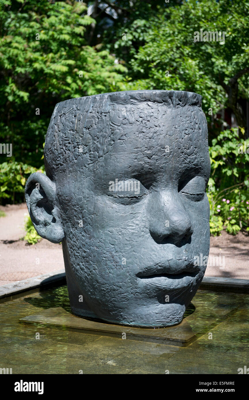 Child's head sculpture, group of sculptures 'spring Astrid' by the Gothenburg artist Berit Lindfeldt in the 2014 opened gardens Stock Photo