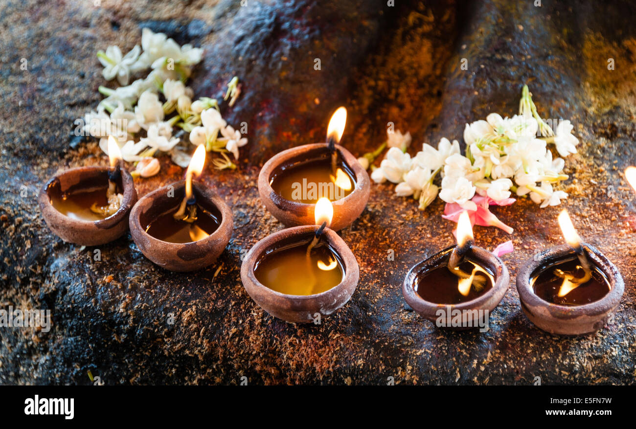 Burning candles in clay pots, Brahadhiswara Temple, Thanjavur, Tamil