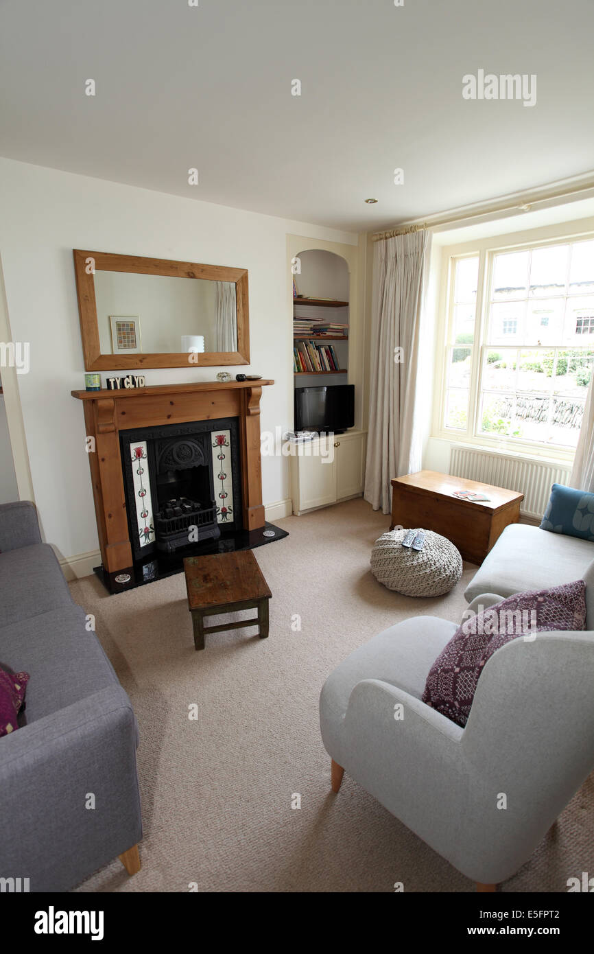Interior Of A Cottage With Traditional Open Fireplace Stock Photo