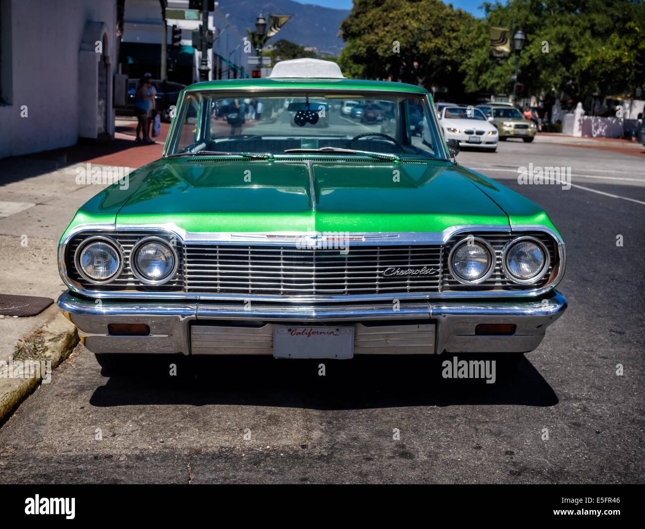 Classic Chevrolet in green serving as a taxi in Santa Barbara, California, USA Stock Photo