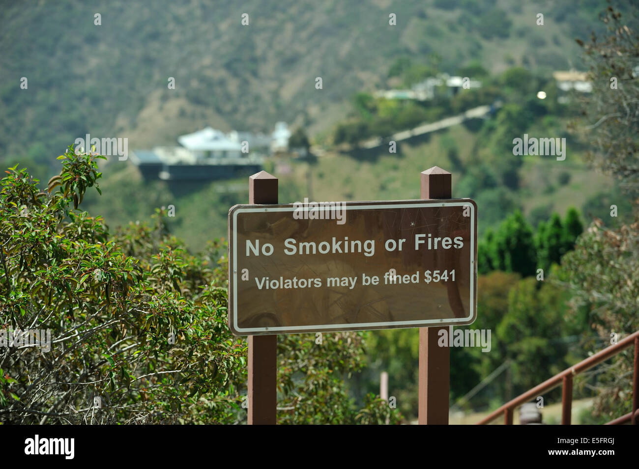 Sign warning of a very specific fine ($541) for smoking or fires Stock Photo