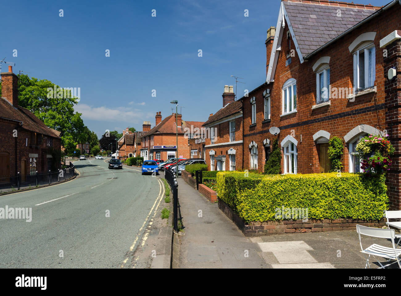 Old red brick cottages in the pretty Worcestershire village of