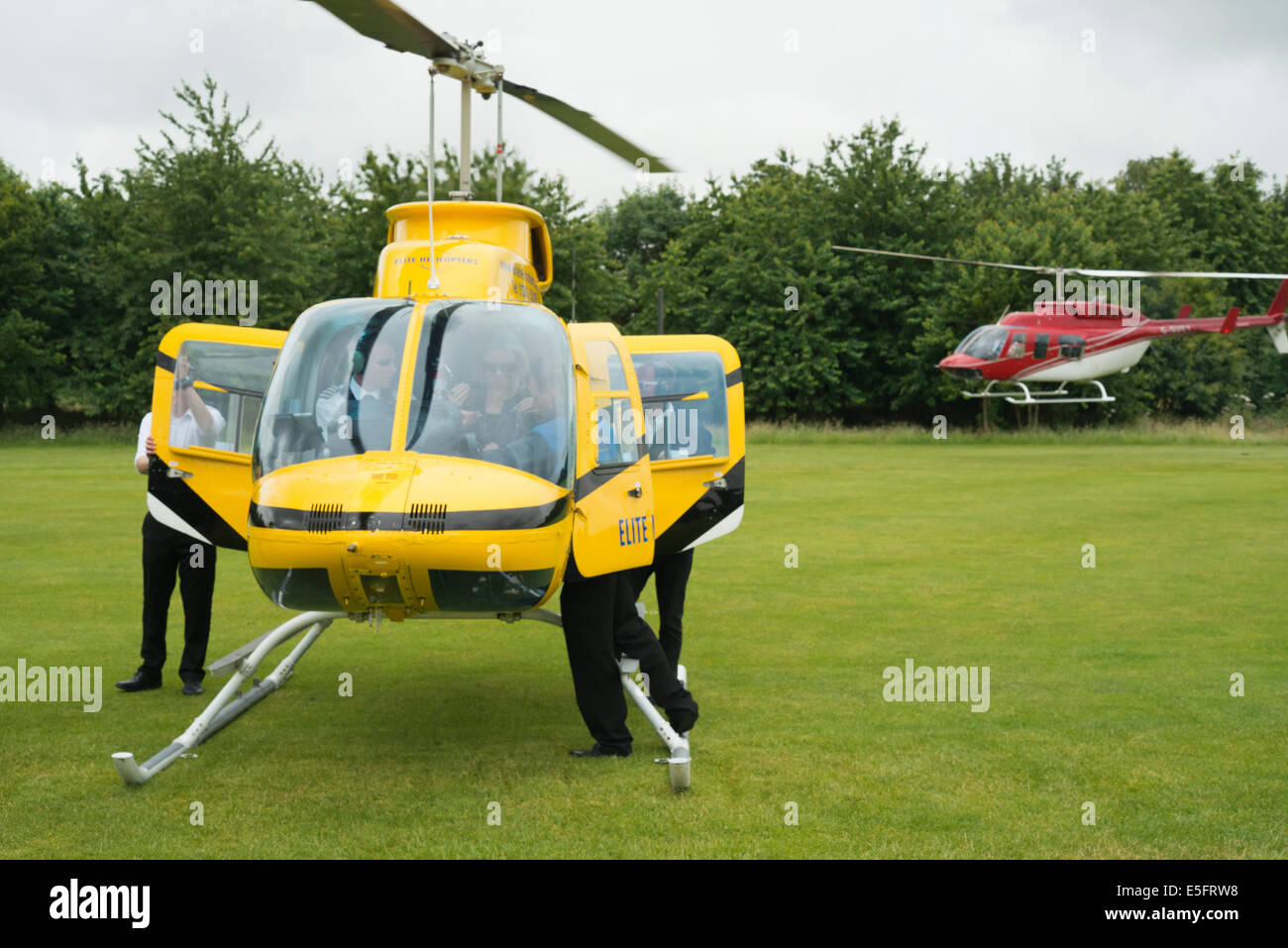 Red and yellow helicopter hi-res stock photography and images - Alamy