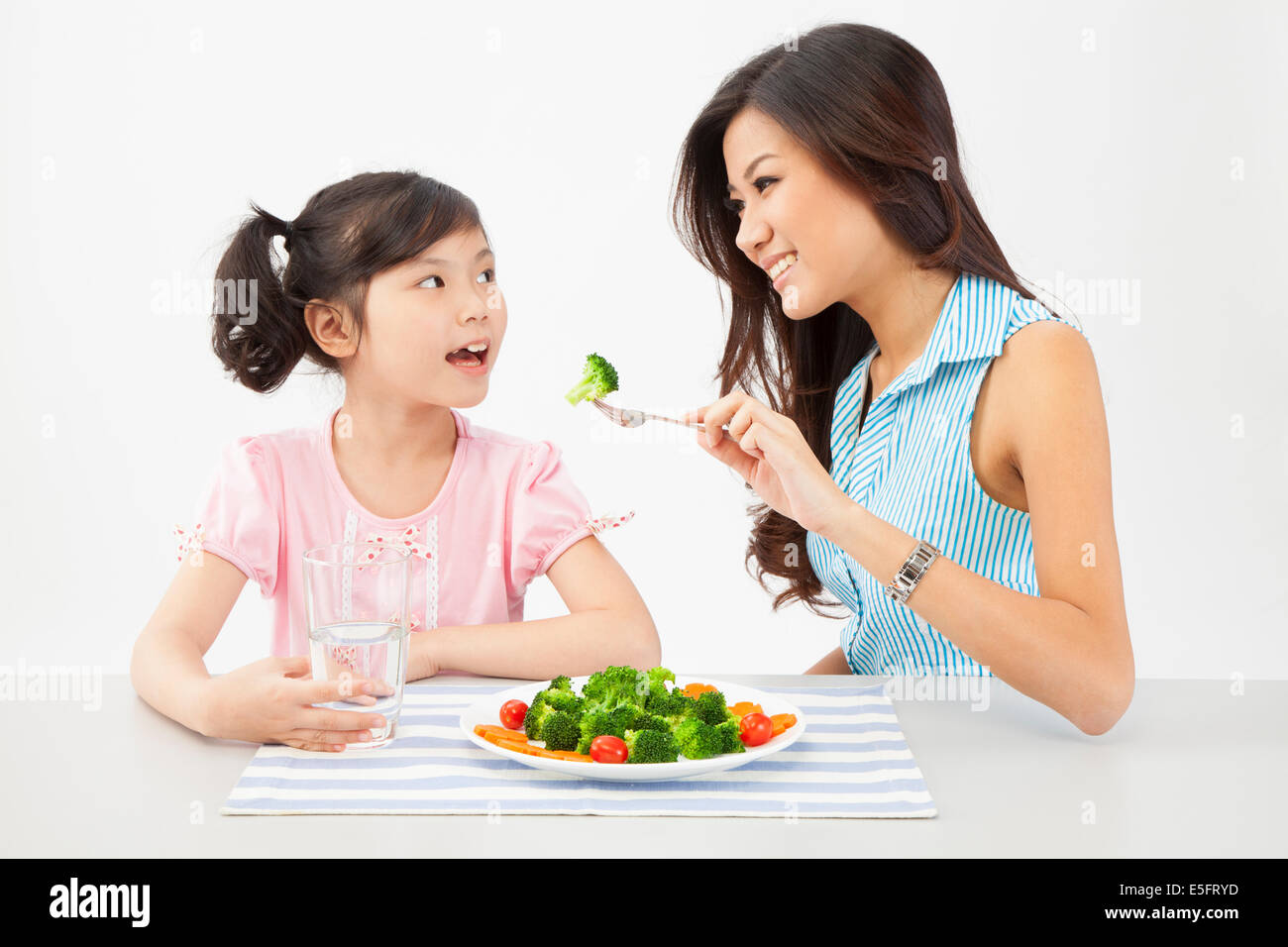 mother feeding her child