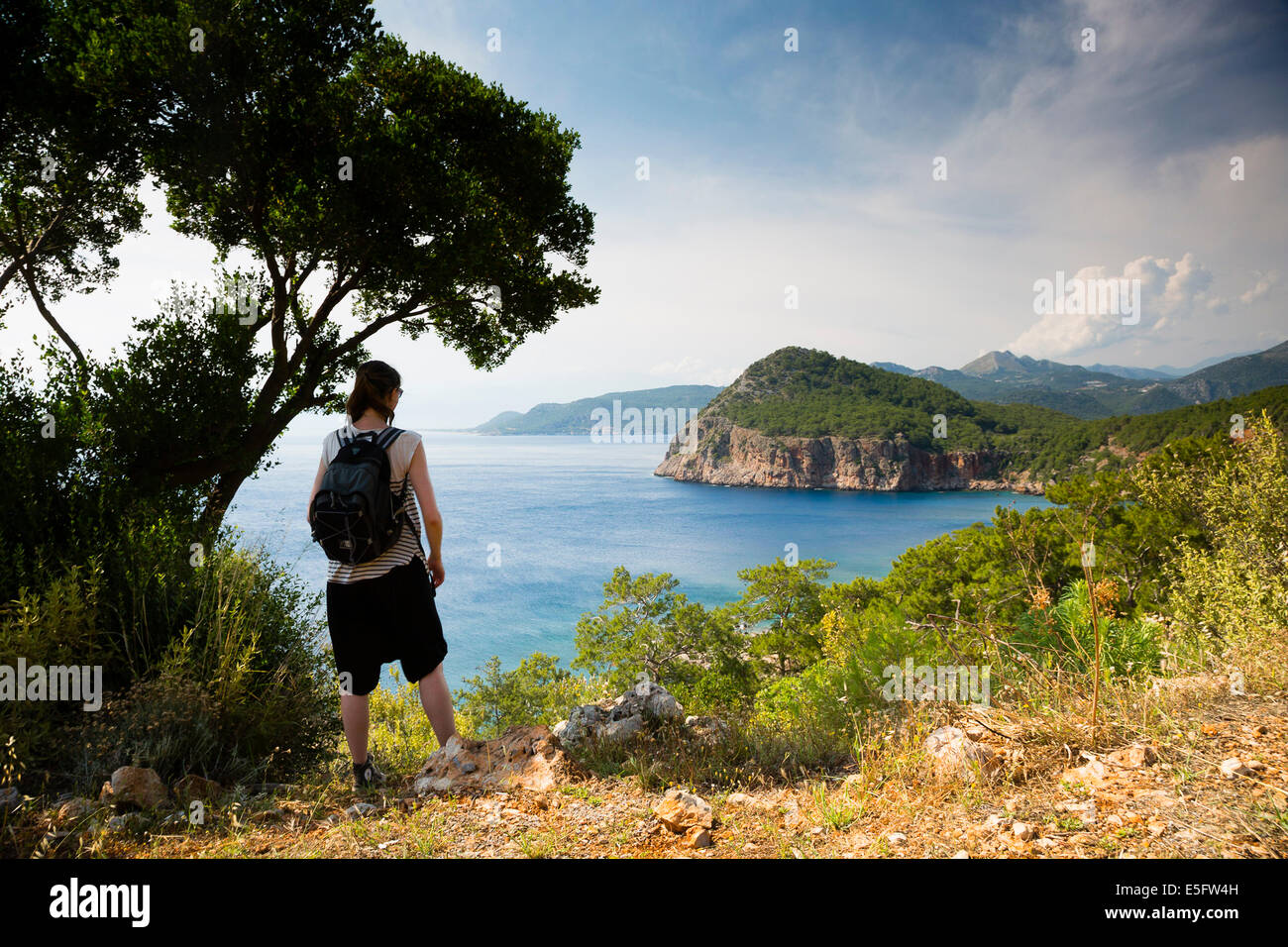 GELIDONIA, TURKEY Melinda Stevenson overlooking turquoise coast on Lycian Way. Stock Photo